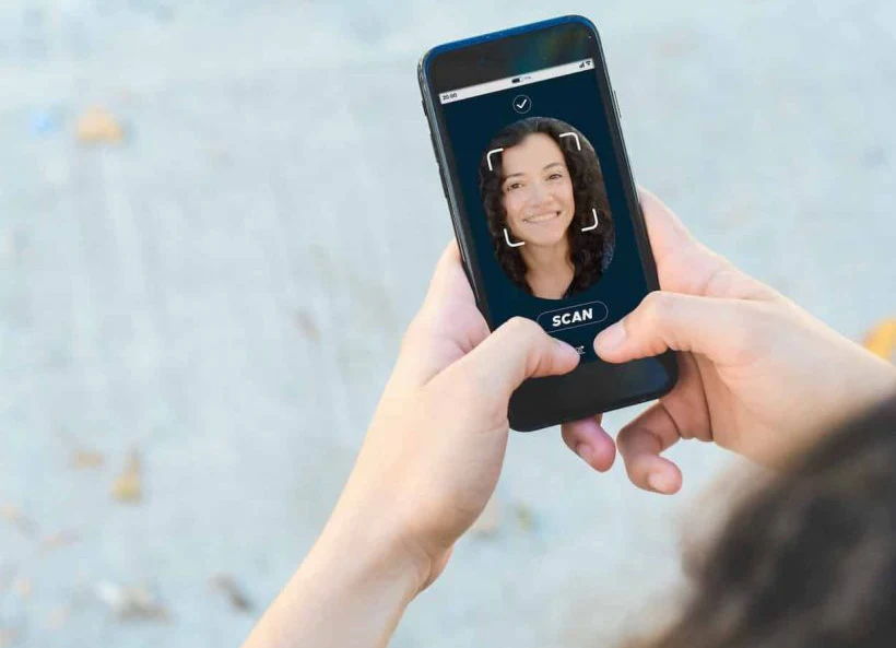 woman-unlocking-smartphone-with-facial-recognition-technology-q57m1tmti43sx06rx3kv838sb48atbdmjqxdtb2i5c